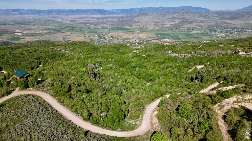 Nestled amidst the natural splendor of Fairview, Utah, this vacant land beckons those seeking an extraordinary residential/recreational retreat. The property offers an unobstructed vista of the picturesque Sanpete Valley, where every evening gifts you with awe-inspiring sunsets that set the sky ablaze in a palette of vivid colors. With this amazing lot you have a canvas to realize your dream cabin, a sanctuary where the stress of the world melts away, and tranquility reigns supreme. Nature lovers will revel in the diverse wildlife that calls this land home. Turkeys, deer, majestic moose, and the elusive mountain lion are among your neighbors, creating a harmonious coexistence with the untamed outdoors. For your convenience, water and power hookups are readily available, ensuring that your cabin or residence can seamlessly blend into this serene landscape. In the winter, reach your haven with ease using a tracked vehicle or snowmobile, ensuring year-round access to your retreat. An active Homeowners Association (HOA) diligently safeguards the community's interests, while maintaining a minimal fee. Their commitment to preserving the neighborhood's essence adds an extra layer of security to your investment. In Fairview, you'll discover a place where the beauty of nature, abundant wildlife, and a supportive community unite to create an unparalleled living experience. Your dream retreat is poised to take shape on this remarkable property overlooking the Sanpete Valley. Embrace the opportunity; this could be your slice of paradise.