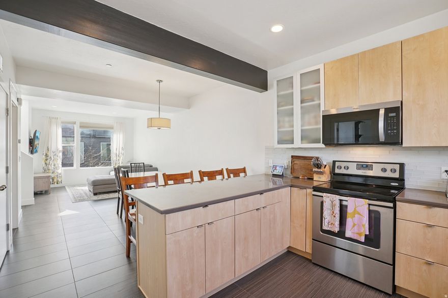 Welcome to this beautifully maintained townhome in the heart of Midvale, featuring a rare private rooftop deck with breathtaking mountain views-the perfect place to relax and watch the sunset. This incredible outdoor space is also ideal for entertaining, offering front-row views for holiday fireworks and unforgettable evenings.   Just minutes from Gardner Village, Top Golf, shopping plazas, restaurants, and everyday amenities. Quick access to I-215 makes commuting throughout the Salt Lake Valley simple and efficient.   Residents can enjoy access to a community clubhouse featuring a pool and fitness center, creating a resort-style living experience right in the neighborhood.  The home is equipped with UTOPIA Fiber internet, delivering ultra-fast and reliable connectivity-perfect for working from home, streaming, and gaming. Homeowners recently added a new furnace and water heater.   This townhome combines modern convenience, lifestyle amenities, and stunning rooftop views, making it a rare opportunity in the Midvale market.