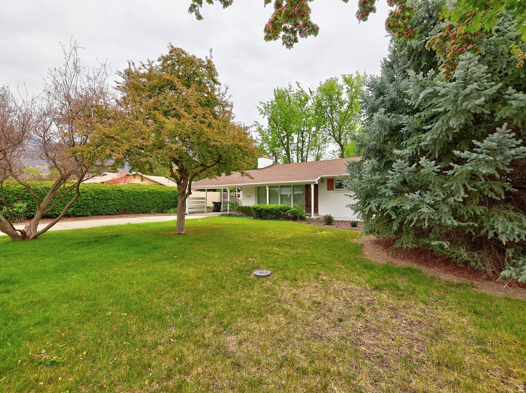 Photo of 1740 E SOUTHMOOR DR, Salt Lake City, UT 84117 (MLS # 2155721)