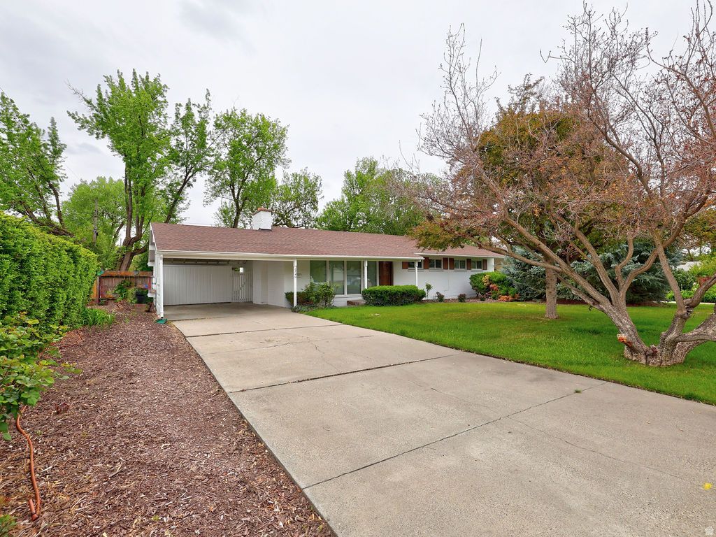 Photo of 1740 E SOUTHMOOR DR, Salt Lake City, UT 84117 (MLS # 2155721)
