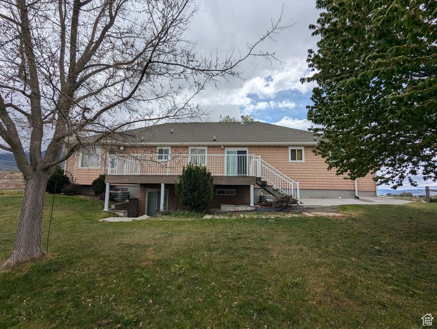 Gorgeous views! .7 acre lot with animal rights. Plenty of room for a shop, garden or animals. Great location. Large spacious floor plan. Room for additional bedrooms in the basement. Walk-out basement with kitchenette-could easily be ADU. Pool table stays! One half share of Mona Irrigation water is dedicated to this property. All figures per county records. Buyer to verify.