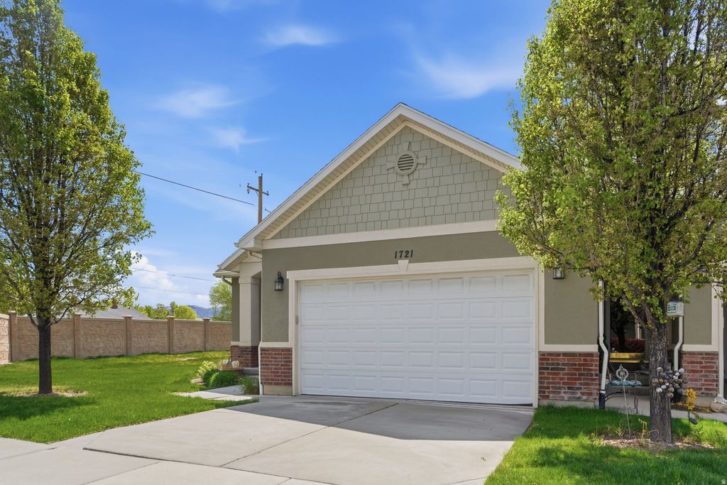 Photo of 1721 W HOLLOW CEDAR LN #1, Riverton, UT 84065 (MLS # 2151918)