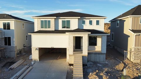 Photo of 6934 W POINTE CEDAR LN S #330, West Jordan, UT 84081 (MLS # 2128952)