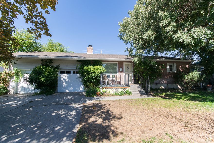 Bring your vision & creativity - this Sandy rambler is ready for its next chapter! Located in a fantastic neighborhood near Southtowne Mall, Jordan Commons, America First Field soccer games & concerts, & lots of restaurants & shopping - you'll love the unbeatable convenience of this central location. The home has great bones & tons of potential, featuring hardwood floors, newer stainless steel kitchen appliances, & two cozy fireplaces. The retro family room with a dry bar adds a fun, nostalgic touch - perfect for movie or game nights. Outside, you'll find a large backyard with a patio area for entertaining, plus a fully fenced front yard for extra privacy. The 3-car garage (one side is a 2-car tandem space) offers plenty of room for vehicles, toys, or a workshop setup. This home needs some TLC, but offers an incredible opportunity to customize it exactly how you want in one of Sandy's most desirable areas. Square footage figures are provided as a courtesy estimate only and were obtained from County records. Buyer is advised to obtain an independent measurement.