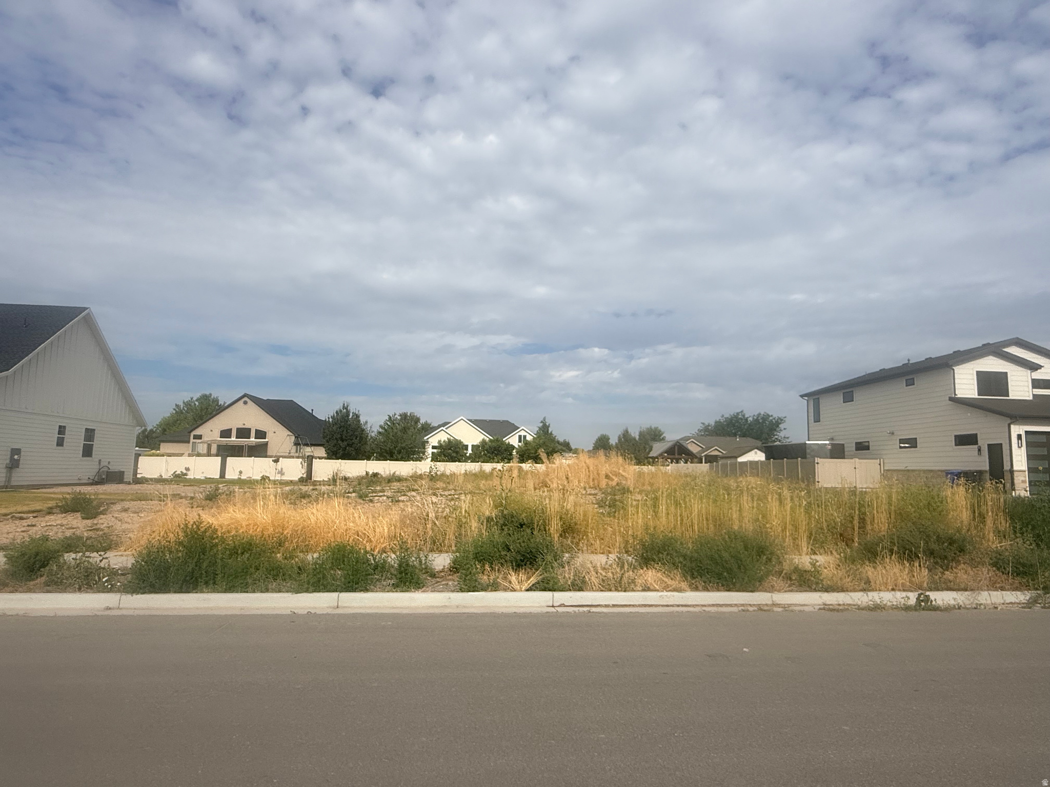 Open lot with a paved street frontage