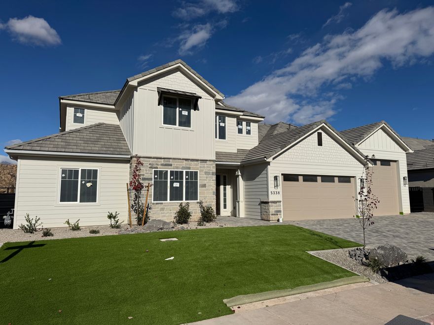 Gorgeous home in the highly desirable Sycamore Village subdivision. Backyard is a dream with a salt-water pool, lush palm trees, & large turf area. Boat garage great for all your toys in Southern Utah! Open-concept floor plan with large picture windows that flood the home with natural light. Main level offers a second bedroom + an office & 10' ceilings, while the luxurious primary suite showcases exquisite tile work, dual vanities & a spacious walk-in closet. Upstairs there is a second massive living room & a gigantic storage room. Owner/Agent.