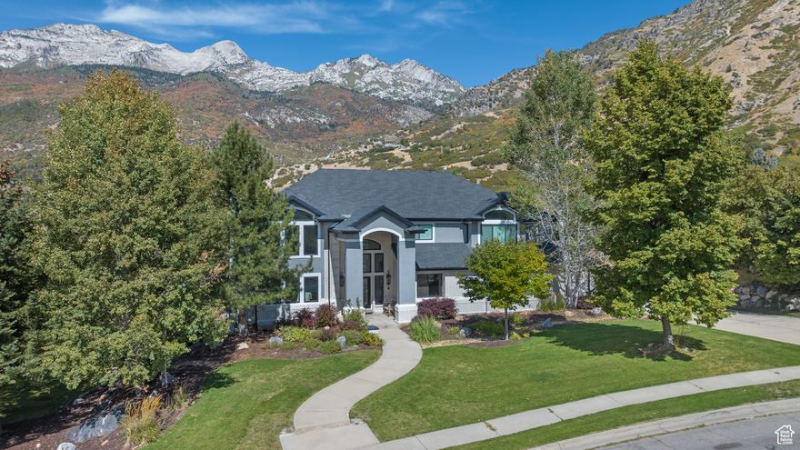 SELLER MOTIVATED! WELCOME HOME! Nestled in the secluded east hills of Alpine, this stunning estate sits on nearly an acre of breathtaking landscape with unobstructed mountain views and direct access to hiking and biking trails. This meticulously maintained home, originally built in 1995, underwent significant updates in 2019, including a new roof, windows, doors, a fully finished basement, and a state-of-the-art Halo system.  The expansive interior features an inviting entryway leading to a grand living room with a stone fireplace, hardwood floors, and floor-to-ceiling windows that capture the stunning surroundings. The master suite is a private retreat with an attached study/workout room, two walk-in closets, a walk-in shower with dual shower heads, and a luxurious jetted tub.  The newly finished basement offers a versatile game room/study center, a kitchenette, a separate reading room, and a high-end theater room with every upgrade imaginable, including its own heating/AC unit, extra insulation, and soundproofing.  This home boasts 6 bedrooms, 5 bathrooms, and 2 laundry rooms, along with plantation shutters throughout. An attached 3-car garage is complemented by a 40-foot detached, heated RV garage-perfect for housing boats, RVs, and recreational toys. The backyard is an oasis with horse rights, a luxury chicken coop, and ample space to add a pool, sports court, or both.  Located in one of Utah's most sought-after cities, Alpine has been recognized as a top place to live, with award-winning schools and close proximity to Silicon Slopes, Thanksgiving Point, and premier dining and shopping. Don't miss the chance to make this exceptional property your next home!