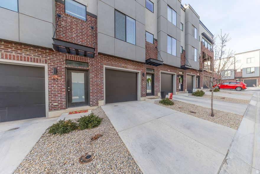 Built in 2023, this modern and well-maintained 2 bedroom townhome offers a great floor plan in an excellent North Salt Lake City location. The home features a walkout balcony, quartz countertops, gas range, and a hot tub (included) for year-round enjoyment, along with a finished backyard and a huge finished double-deep tandem garage with plenty of space for storage and toys. Enjoy the lifestyle perks of an HOA that includes a picnic area, basketball/sports court, walking trails, dog park, gazebo, sitting areas, and snow removal. Located close to Hatch Park, jogging and mountain bike trails, and with easy freeway access.  Easy to show, give us a call today!