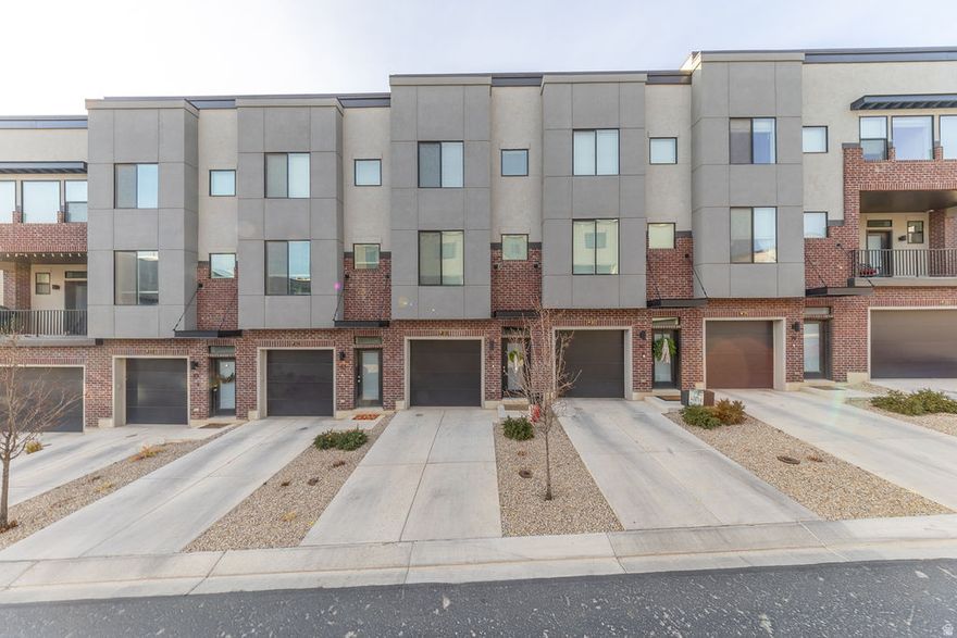 Built in 2023, this modern and well-maintained townhome offers a great floor plan in an excellent North Salt Lake City location. The home features a walkout balcony, quartz countertops, gas range, and a hot tub for year-round enjoyment, along with a finished backyard and a huge finished double-deep tandem garage with plenty of space for storage and toys. Enjoy the lifestyle perks of an HOA that includes a picnic area, basketball court, walking trails, dog park, gazebo, sitting areas, and snow removal. Located close to Hatch Park, jogging and mountain bike trails, and with easy freeway access, this townhome perfectly blends comfort, convenience, and outdoor recreation.