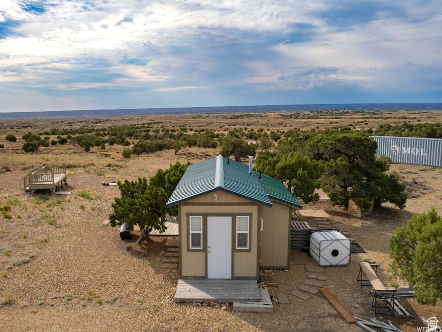 MOONDANCE RANCH!  Between Duchesne and Bridgeland-south of highway 40!  This is a Tiny Home on 43.67 acres!  Very private! Acres of Pinion and juniper!  Created by an Architect for himself and his family!  Totally off grid.  2 generators.  It has a water storage tank room.  Buyer to bring in their own water or ask us who can deliver it for you.  Bathroom has a shower and compost toilet.  Propane wall heater and refrigerated window A/C unit.  If the buyer wishes, well and septic system can be added at Buyer's expense.  A small shallow, pleasant seasonal creek carries water through the trees and over short geological formations during storms and winter run-off.  Resident deer and antelope, and the occasional visiting Llama!  This property has wonderful hiking and great views!  Lots of dirt roads connect for your adventures!