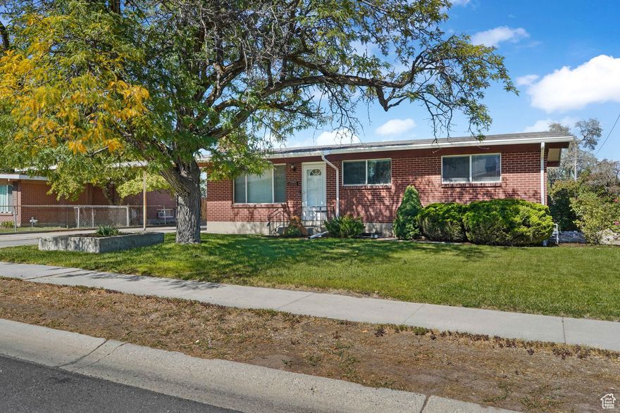 Welcome to this charming all-brick rambler with modern updates and a dream workshop! Major upgrades include a new architectural shingle roof with seamless gutters, updated plumbing and electrical, newer furnace, and added insulation for comfort and efficiency. Inside, the updated kitchen features white cabinetry, tile backsplash, and stainless steel appliances, opening to bright dining and living spaces. The finished basement offers extra bedrooms, a spacious family room, and a convenient laundry area with plenty of storage. Out back, you'll find a large yard plus an oversized detached garage/workshop with new siding, 80-amp subpanel, workbenches, ample lighting, and compressor setup-perfect for projects, storage, or hobbies. Conveniently located near schools, shopping, and commuter routes, this home blends classic curb appeal with serious functionality.