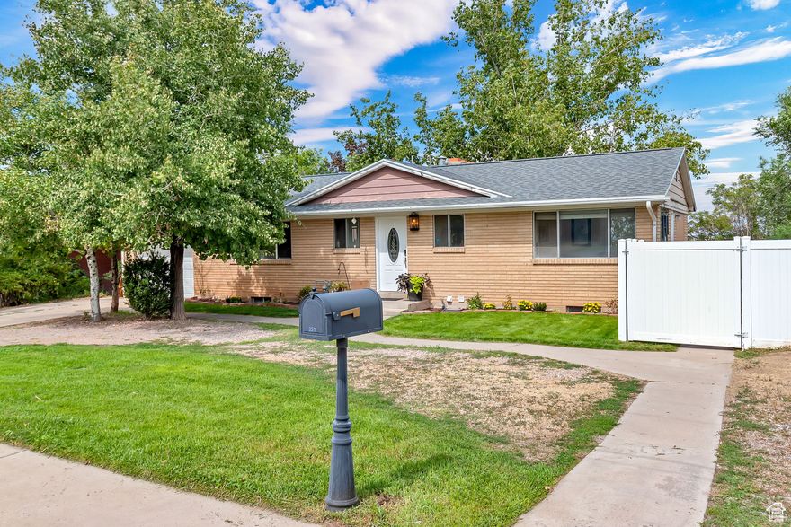 Enjoy breathtaking views of the lake and valley from this beautiful home in Payson. Featuring a brand-new deck perfect for entertaining, the property also boasts large windows in the basement that flood the space with natural light. The basement includes a complete mother-in-law apartment with a private exterior entrance, offering flexibility for extended family, guests, or potential rental income.  The roof has been recently redone, providing peace of mind and long-term value. Inside, you'll find spacious living areas designed to capture the surrounding scenery, while outside the deck creates the perfect spot to relax and soak in the panoramic views.  This home combines comfort, functionality, and beauty in one ideal package-don't miss the opportunity to make it yours!