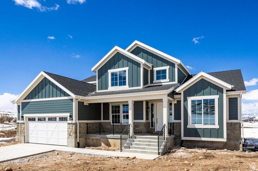 This professionally designed and thoughtfully laid-out, newly built Ivory home is the epitome of modern comfort. The Hamilton is one of Ivory's most popular floor plans and provides what so many are looking for with today's lifestyles; the beauty of a two-story with the convenience of main floor living. Featuring large windows filling the space with natural light, a covered expanded deck out back and an expansive three car garage making this property a must see. The kitchen showcases quartz countertops, cafe stainless steel appliances and a walk-in pantry. The unfinished basement offers even more possibilitiesfor owners to either use as storage or finish foradditional living space. Located in close proximity to the UintaMountains and Park City this property is perfect for those who love year-round outdoor adventure.