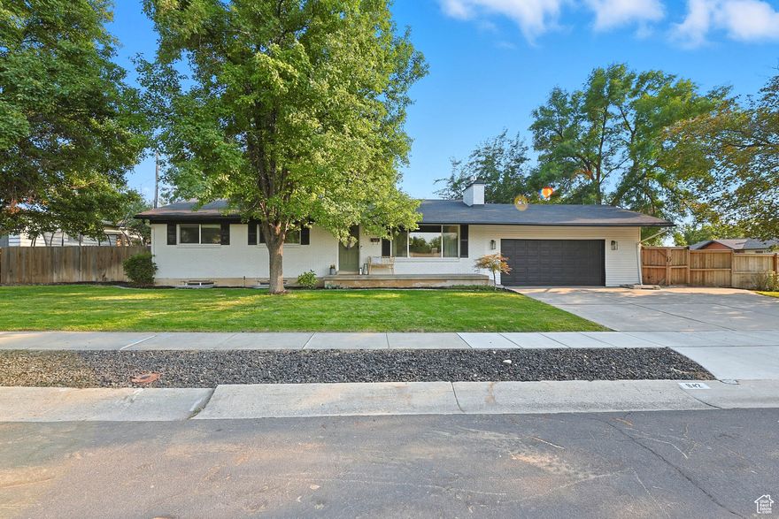 Large price improvement! Beautifully updated home in coveted Daysen Heights! This 6-bed, 3-bath, 2,632 sq ft property offers an professionally updated kitchen (2021)  with custom cabinets and new countertops, a brand-new fireplace and mantel, new banisters/railings, refreshed bathrooms, and updated A/C, heating, and garage door systems. The spacious backyard is fully fenced with mature shade trees and automatic sprinklers. Located on a quiet street less than a minute's walk to the elementary school, with easy access to shopping, dining, and world-class skiing in the Cottonwood canyons.