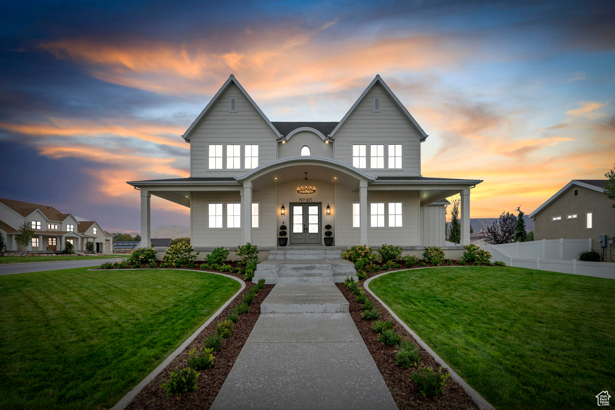 Welcome to this stunning custom-built home, completed in 2023 and set on .7 acres in the heart of Mapleton. Designed with an open floor plan, 10-foot ceilings, and a 20-foot great room, this home feels bright, spacious, and inviting. The kitchen is built for both everyday living and entertaining, featuring quarts countertops, a 48-inch Italian Ilve gas range, dual Bosch dishwashers, and a large butler's pantry with room for an extra oven or fridge. The bathrooms boast of beautiful finishes that include granite & marble countertops. A bonus studio space with its own entrance is prepped for a full kitchen-great for guests, an office, or a rental. The walkout basement has tall ceilings, finished framing, and ductwork, ready for your final touch. Bring your animals-chickens, horses, goats, and pigs are all allowed (just no cows). This property offers the best of modern comfort and country living in one of Mapleton's most peaceful settings.