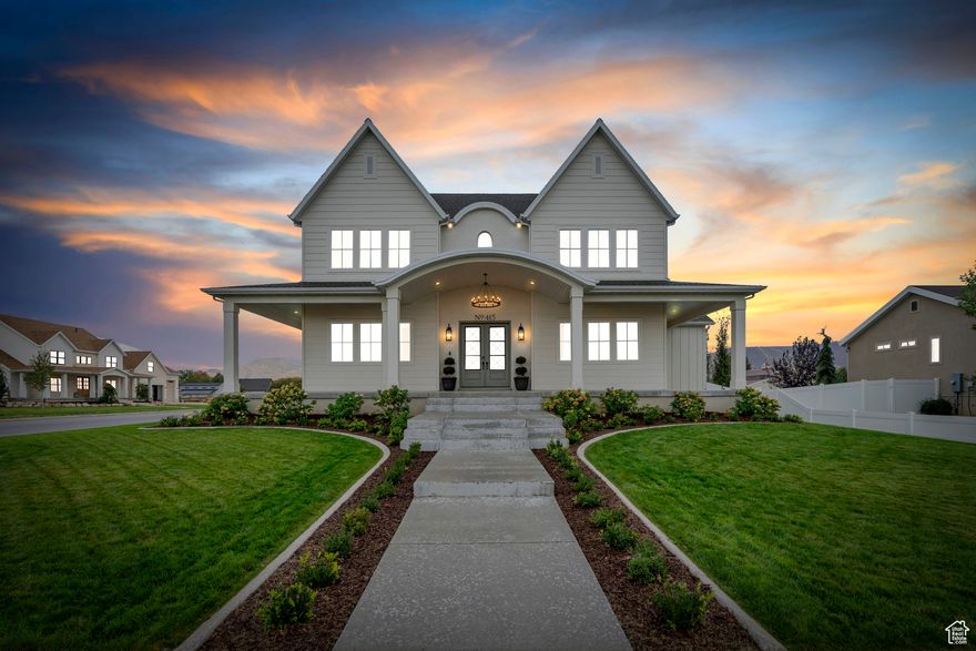 Welcome to this stunning custom-built home, completed in 2023 and set on .7 acres in the heart of Mapleton. Designed with an open floor plan, 10-foot ceilings, and a 20-foot great room, this home feels bright, spacious, and inviting. The kitchen is built for both everyday living and entertaining, featuring quarts countertops, a 48-inch Italian Ilve gas range, dual Bosch dishwashers, and a large butler's pantry with room for an extra oven or fridge. The bathrooms boast of beautiful finishes that include granite & marble countertops. A bonus studio space with its own entrance is prepped for a full kitchen-great for guests, an office, or a rental. The walkout basement has tall ceilings, finished framing, and ductwork, ready for your final touch. Bring your animals-chickens, horses, goats, and pigs are all allowed (just no cows). This property offers the best of modern comfort and country living in one of Mapleton's most peaceful settings.