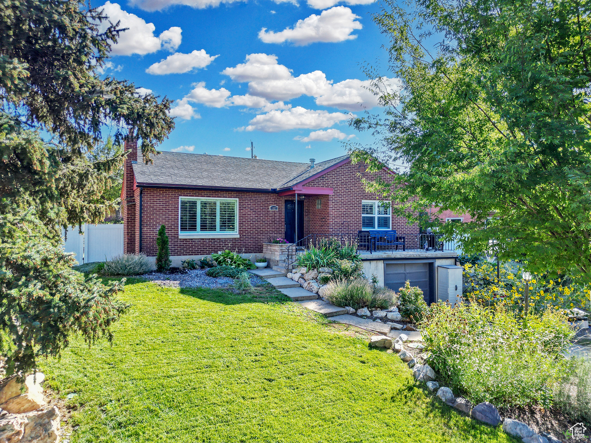 Welcome to this beautifully updated home located on Ogden's desirable East Bench, just minutes from Weber State University, hiking trails, grocery stores and local restaurants. This home features modern upgrades throughout while retaining its original charm. Updates include: New cabinets and granite countertops in the kitchen and bathrooms, new light fixtures and ceiling fans throughout the home, new windows upstairs and down, new sump pump installed in 2025 with drainage system that includes transferable warranty and an additional exterior sump pump was installed in 2024, new HVAC installed in 2024 with Dual Zone function (you can heat/cool the upstairs/downstairs independently), upgraded upstairs electrical and brand new electrical downstairs, Pex plumbing and fully remodeled basement. Don't miss this rare opportunity to own a move-in ready home in one of Ogden's most sought-after neighborhoods!