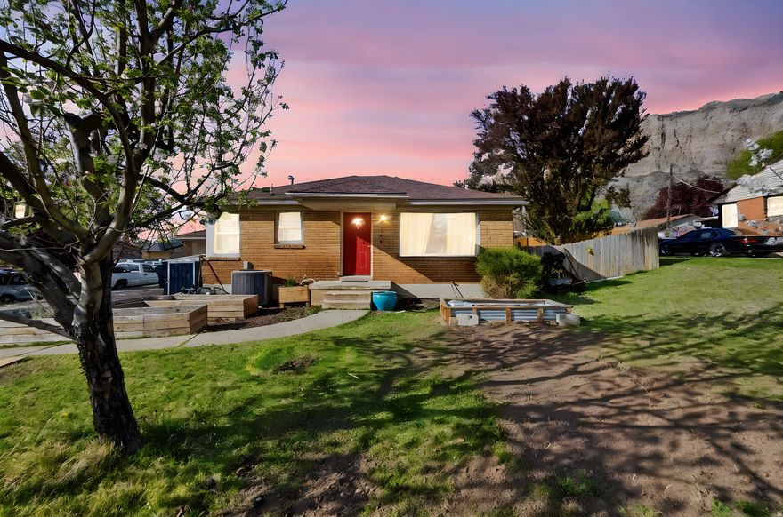 Located on Ogden's highly sought-after East Bench, this cozy rambler offers breathtaking views of Ben Lomond Peak and the surrounding foothills right outside your front door. Surrounded by some of Ogden's best hiking and biking trails. Enjoy close proximity to Ogden Canyon, ski resorts, the river, and Pineview Reservoir, all just a short drive away. The private, fully fenced backyard is perfect for relaxing summer evenings. A rare opportunity to enjoy easy access to nature and year-round adventure. Plenty of potential to make it your own in one of Ogden's most desirable areas.