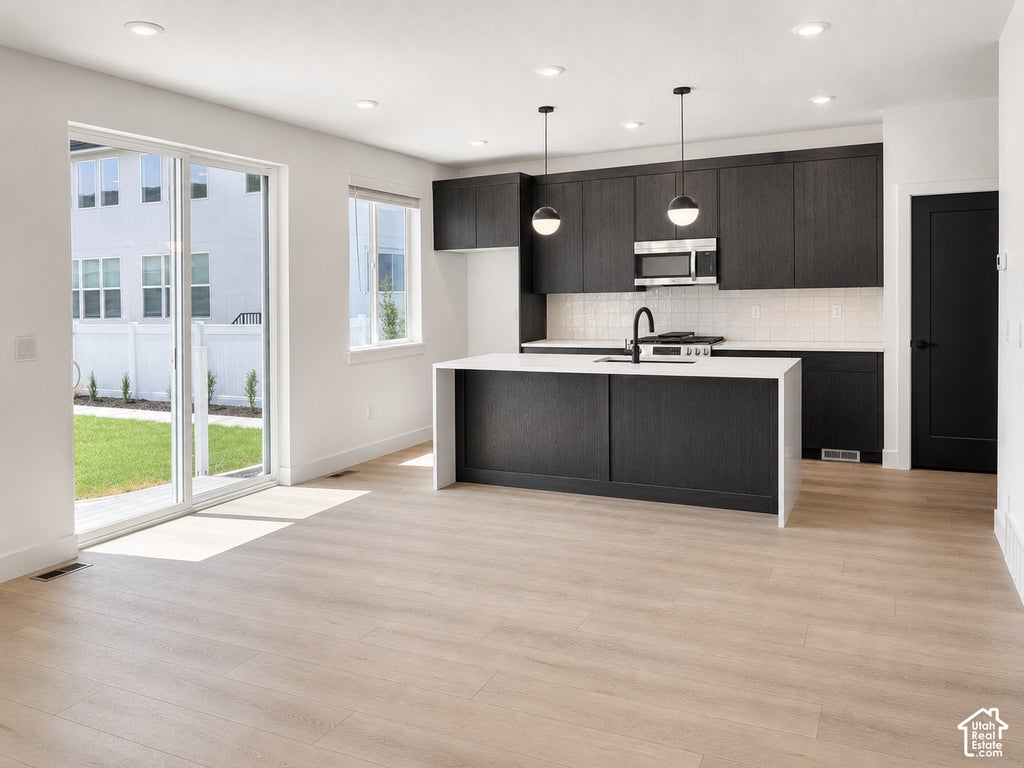 Photo of 284 E LEGACY TRAIL LN S #4, Midvale, UT 84047 (MLS # 2191110)