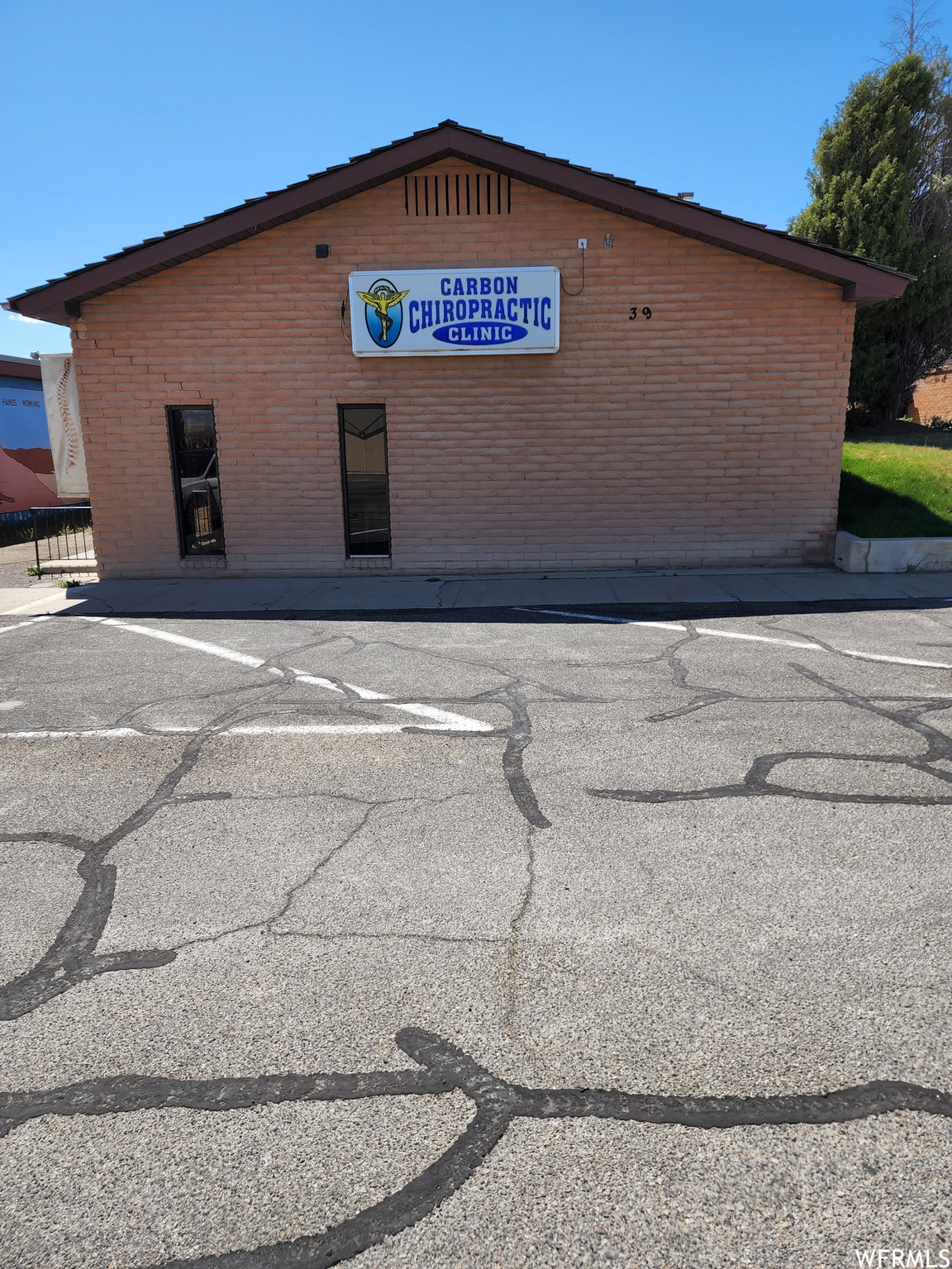 This office space also includes waiting room, reception desk, 2 sauna room, file room, X ray room, utility room, whirl pool room. 9 AND 11 foot ceilings, 4 suite have sinks, construction of walls are 8 in cinder, with3/1/2 inch stump block with Styrofoam wood walls, partial vaulted ceilings, furnace is approx. 2 year old.