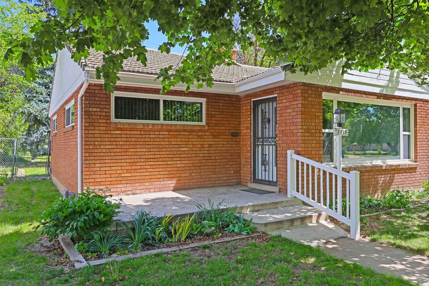 Whether you're looking to offset your mortgage, create passive income, or bring family closer, this property gives you the flexibility to do it all. This is more than a home... it's an opportunity to build wealth, create flexibility, and design your future.  Sitting on a spacious .28-acre lot, this property offers something incredibly rare-the ability to add an ADU (Accessory Dwelling Unit) in the backyard (per Ogden City guidelines).   Imagine a private space for family  A rental generating monthly income  Or a fully separate living area to offset your mortgage  Opportunities like this don't come along often.  Inside, the home features fresh paint and beautiful hardwood floors, creating a clean and comfortable living space you can enjoy immediately.  The 2-car garage gives you room for storage, toys, or projects-while the expansive yard offers endless possibilities.  And let's talk about one of the most overlooked (but powerful) features...  2 water shares included-helping you maintain your property without the burden of high water costs.  Location? Exactly where you want to be. With quick access to I-15 and just minutes from Hill Air Force Base, commuting is simple while still keeping you close to the mountains for hiking, biking, and outdoor adventure.  And yes-the kitchen is ready for your personal touch... giving you the chance to customize and add value without overpaying for someone else's remodel.