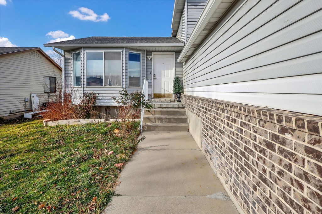 Photo of 6084 S LONGMORE DR W, Salt Lake City, UT 84118 (MLS # 2131550)