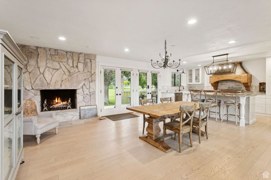 Welcome to your own private slice of Midway paradise where mountain views, 100-year-old apple trees, and endless adventure come together on this rare 1.05-acre property. Tucked away on quiet Stringtown Road, this beautifully updated 4-bedroom, 3-bathroom home offers 3148 sq ft of thoughtfully designed living space with room to roam, relax, and play. Step outside and you'll find a backyard built for memories. Gather around the firepit under the stars, pick apples straight from your own historic orchard, or enjoy a morning ride from your private equestrian area directly onto miles of trails that lead all the way to Cascade Springs. With space for your horses, chickens, RV, and a sprawling garden, this property blends country living with modern comfort. Located just three minutes from Soldier Hollow Golf Course and Nordic Center, you're also within 30 minutes of Park City, Deer Valley, and Sundance for world-class skiing, dining, and entertainment. Whether you're looking for a year-round residence or a vacation retreat, this home delivers the perfect balance of privacy, recreation, and lifestyle. This property is more than a home. It's a lifestyle. Schedule your private showing today and come experience why 880 Stringtown is one of Midway's most sought-after retreats.  Square footage figures are provided as a courtesy estimate only.  Buyer is advised to obtain an independent measurement.