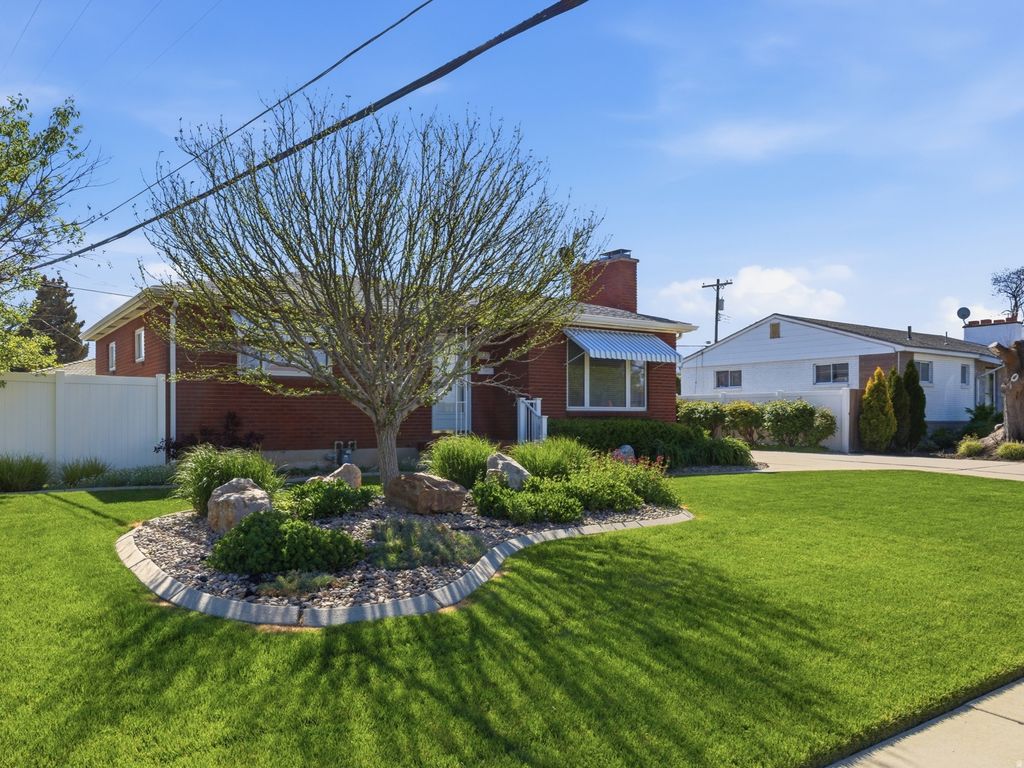 Photo of 8137 S ROOSEVELT ST W, Midvale, UT 84047 (MLS # 2154315)