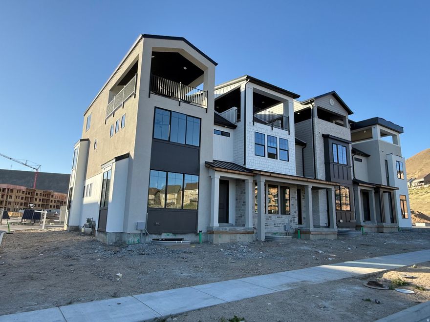 Check out our luxury at Vistas Townhomes, perfectly located in the heart of Lehi's thriving Silicon Slopes area. These thoughtfully designed townhomes feature contemporary architecture, open-concept floor plans, and high-end finishes, ideal for both daily living and entertaining. These townhomes offer private terraces with stunning views of Utah Valley. Rear-loaded garages and smart layouts provide both convenience and style. Located close to shopping, dining, outdoor recreation, and major tech employers, Vistas offers an unbeatable blend of comfort and accessibility. Experience low-maintenance living in one of Utah's most desirable communities. This townhome community will have approximately 100 units, and the first building will be completed in April/May. Contact agent for private showing!