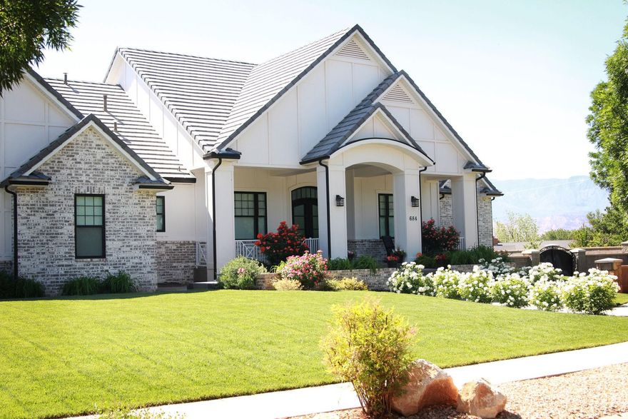 Located on a tree lined street in desirable Hurricane neighborhood, this spacious 6 bedroom, 4 bath home home situated on .51 acre lot and showcases luxury and designer upgrades throughout. The open concept main level features soaring vaulted ceilings and a light filled living room that flows seamlessly into the gourmet kitchen with a large island, high end appliances, custom cabinetry and hidden walk in pantry. The finished basement offers a spacious family room, 4 bedrooms and 3 baths. Step outside to our private backyard oasis complete with a saltwater pool, full size sports court, basketball court and lush mature landscaping. An exceptional blend of upscale design, space and resort style living in one of Hurricanes most desirable neighborhoods.