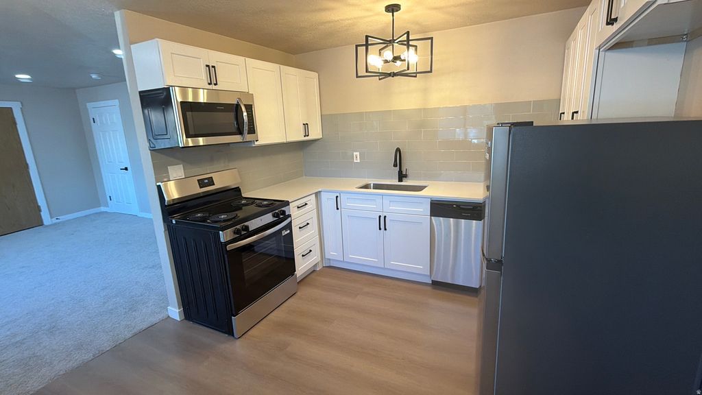 Photo of 647 SWENSON AVE #4, Springville, UT 84663 (MLS # 2151074)