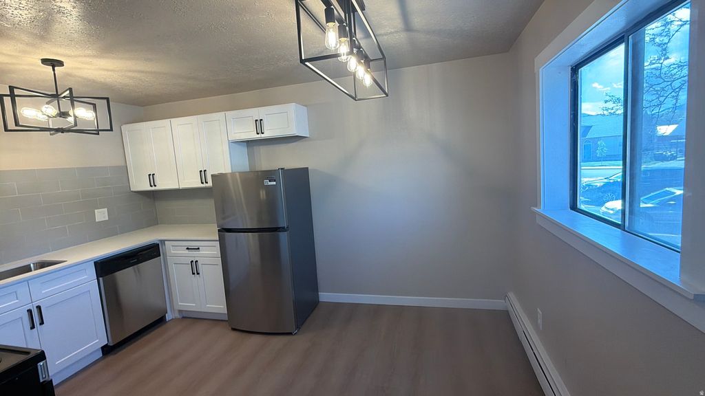 Photo of 647 SWENSON AVE #4, Springville, UT 84663 (MLS # 2151074)