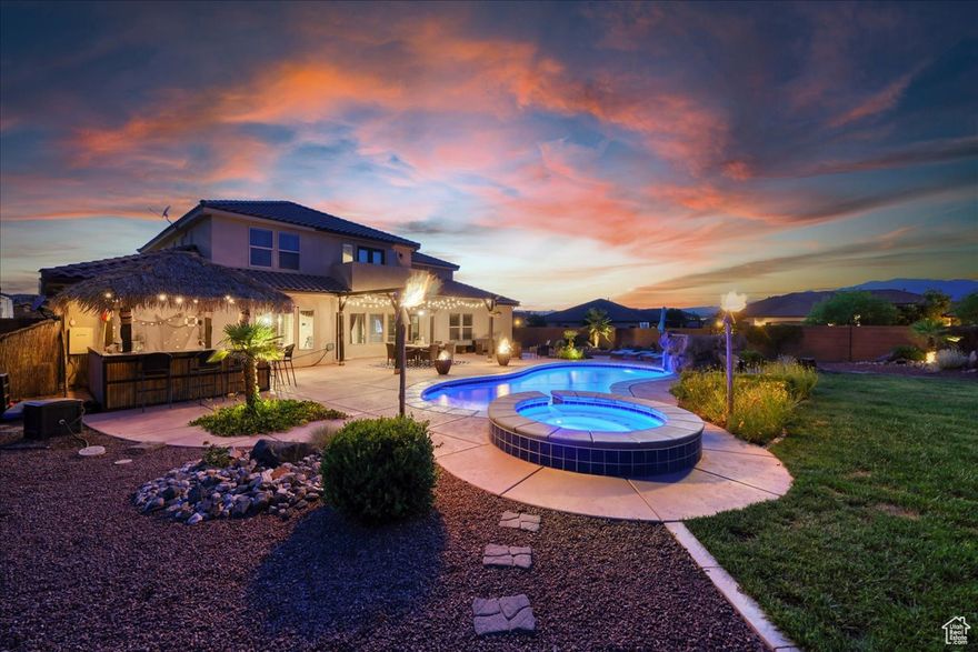 No showings at this time. Stunning back yard oasis for entertaining. 6 bedrooms, theater room, family room, den/office, RV parking, pool, hot tub, gas tiki torches, 3 fire pits, and outdoor kitchen, outdoor furniture is included. Both space and relaxation