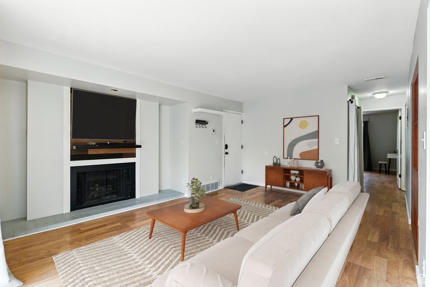 Incredible landscaped Community feels like a private Oasis all for you. This top-level unit features a Trex deck, newer windows, granite countertops, a cozy fireplace with a large mantel piece, a Galley Kitchen, one covered parking spot, and one shared 2-car garage.