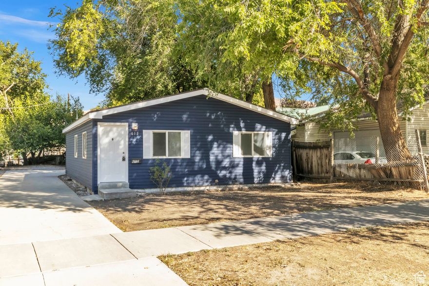 **Remodeled Gem in a Quiet, Tree-Lined Neighborhood**  Welcome to 612 W 200 N - a beautifully updated home nestled in a peaceful, secluded pocket of Salt Lake City, surrounded by mature trees and just three blocks from the TRAX station for easy commuting. Step inside to discover brand-new LVP flooring, sleek quartz countertops, and upgraded appliances that bring modern comfort to every corner. Fresh vanities and finishes elevate the bathrooms, while the spacious primary suite features a large walk-in closet. The two additional bedrooms offer generous closet space, and outside, a private driveway accommodates parking for 45 vehicles - a rare find in this area.  Minutes from downtown.  This move-in-ready home blends style, convenience, and tranquility - perfect for anyone seeking a quiet retreat with urban access.