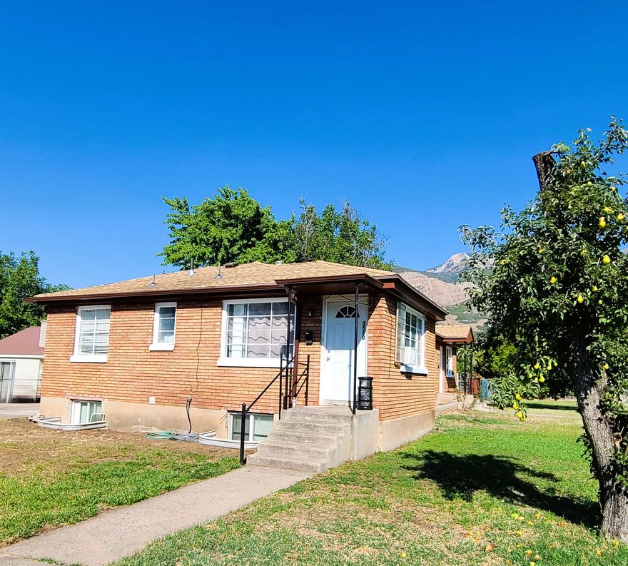 All-brick, side-by-side duplex conveniently located near Weber State University and just minutes from popular hiking and biking trails. The east unit has a covered patio. Each unit enjoys its own fenced yard space, with updates throughout including new or newer: gutters, LVP flooring, paint, water heaters, kitchen cabinets, and beautiful granite countertops. Both furnaces have been recently serviced, and the roof was replaced within the last 10 years. Excellent opportunity for investment or live in one side and rent out the other! Rents while occupied were $1870 and $1890. Agent is related to seller.