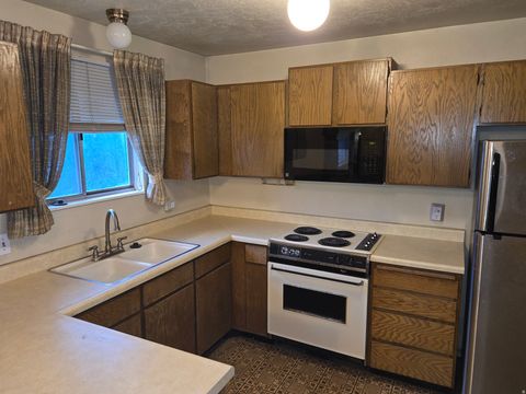 Tiny photo for 3876 S BURNINGHAM DR W, West Valley City, UT 84119 (MLS # 2123447)