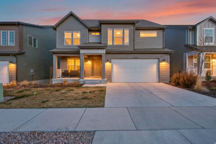 Please join us for an Open House Saturday 3/28/26 11:00-1:30! Welcome home to this nearly-new masterpiece in the master-planned Wildflower community. Only a year old, this home features a massive floorplan with a versatile walkout basement-a rare find at a price point significantly lower than building from scratch. The interior is bright and airy, perfectly situated to take advantage of the clubhouse, lake views, and miles of trails that make Saratoga Springs so desirable. It's the perfect blend of modern style and established value.