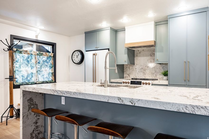 Steps to Skiing | Remodeled | Great for Rentals | Amenities | Easy Parking - Only  Steps from Park City Mountain Resort and the free bus route, this designer-renovated 2-bedroom, 2-bath condo offers unbeatable access to skiing, dining, and year-round adventure. Completely transformed in Fall 2025, this condo features a stunning high-end kitchen with granite countertops, deep custom cabinetry, GE Caf appliances, and a washer/dryer combo. The open-concept layout, contemporary finishes, and low-maintenance ceramic flooring throughout create a clean, modern feel that is both comfortable and stylish. Sold fully furnished, this turnkey property has a strong rental history. It includes a valuable lockout feature, allowing it to be rented as a one-bedroom with a hotel-style suite or as a full two-bedroom to maximize both personal use and rental income. Community amenities include a year-round outdoor pool and spa, his-and-hers saunas, onsite laundry, garage parking, and additional guest parking. In winter, enjoy quick access to world-class skiing steps away, and in summer explore nearby hiking and biking trails while experiencing Park City's vibrant mountain lifestyle. Exceptional opportunity with unparalleled access to both the mountain and town!