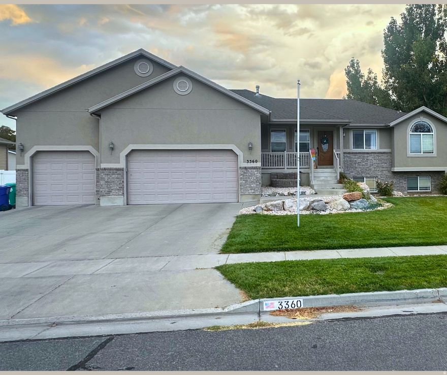 Inside, outside, and even in the garage, this home checks all the boxes! South-facing rambler on a 1/3 acre lot. No HOA. Convenient 16-minute commute to Hill AFB. Beautifully updated throughout with a professionally remodeled basement. The home features the primary bedroom suite upstairs with a second bedroom suite downstairs, and washer-dryer hookups on both levels. Formal room or office space at the front entry; vaulted ceilings; engineered hardwood floors; a corner gas-log fireplace. Kitchen features include an abundance of cabinets and counterspace; an oversized pantry; a kitchen island with storage and an overhang to accommodate seating; granite countertops; composite granite sink; like-new stainless and black appliance package: free-standing double-oven electric range with an auxiliary gas connection already plumbed, over-range microwave oven, a sideby-side refrigerator with in-door ice and water. Mud room-laundry room at the garage entry door. The primary bedroom features a walk-in closet with built-in shelving; private bathroom with double sinks, corner jetted tub, and a separate oversized shower with pebble floor. Downstairs are above-grade windows that allow for lots of natural light; new carpet; a family room; three more bedrooms and two additional full bathrooms, one with a private bathroom and walk-in closet; a full-sized laundry room; tons of storage space. Even the utility room has features! Cold storage area; on demand hot water heater; new water softener; water filtration system. For internet, cable TV, and streaming services, Xfinity and UTOPIA Fiber are both available. The vinyl-fenced backyard is a perfectly peaceful retreat, private enough that you're not looking at the back of your neighbor's house, and features an attractive wood-sided shed; newer Trex deck. Full automatic sprinkler system connected to secondary water. And just for fun, there's a programmable JellyFish lighting system on the front eaves of the home. The 4-vehicle heated garage has extra tall ceilings; a workbench with cabinets; steel shelving that stays; a man-door that leads to the backyard. The 16' wide, 42'+ long gravel RV pad runs almost the full west side-yard of the lot, behind the gate and to the shed in the back