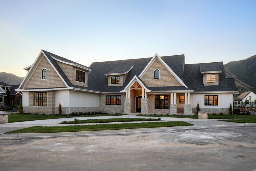 Welcome to 423 S 150 E in the heart of Mapleton! This beautiful custom home was featured in the 2025 Utah County Parade of Homes and was thoughtfully designed to combine luxury, comfort, and modern living. Featuring an open floor plan, quality craftsmanship, and incredible mountain views, this home offers both style and functionality throughout.  Inside, you'll find a spacious gourmet kitchen with high-end appliances, a large vaulted-ceiling living area, and a relaxing main-level primary suite. Oversized windows bring in plenty of natural light, while carefully selected finishes add warmth and elegance to every space.  Located in a quiet, desirable neighborhood close to parks, schools, and everyday conveniences, this home is ideal for anyone looking for peaceful living with upscale design. Reach out today for more information and the opportunity to make this amazing home yours!