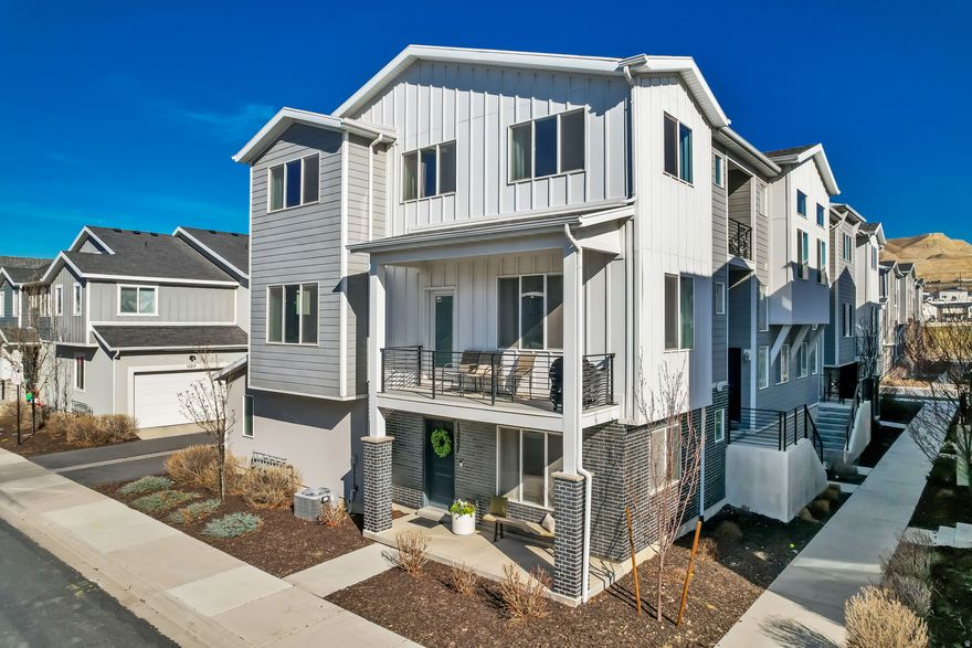 OPEN HOUSE, SATURDAY, March 14 from noon - 2;00 pm. Beautiful end-unit townhome featuring gorgeous 42" kitchen cabinetry, quartz countertops, and a spacious dining and gathering area. This home offers 3 bedrooms (entry-level bedroom needs a door or enclosure), 2 full bathrooms and 2 half baths. The primary suite includes double vanities and a large walk-in closet. 2-car garage.  Fantastic location near all abilities park, schools, trails & playgrounds.  Easy access to I-15 and Redwood Road. Low HOA of $100/month. Buyer and buyer's agent to verify all information.