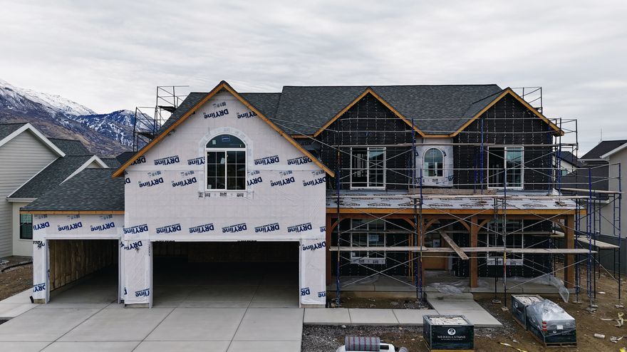 Welcome to The Michelle - one of our most loved and requested floor plans, now available in the final phase of Autumn Crest. This custom home is designed for comfort, style, and unforgettable gatherings. The spacious main floor offers an open layout with an expansive butler's pantry, perfect for those who love to cook, entertain, and host memorable family dinners. Enjoy the two-story family room filled with natural light, a massive mudroom, and dual staircases that add both convenience and architectural character. Upstairs, a generous loft area provides flexible living space. The basement features a private entrance and is ADU-ready, offering the potential for a future apartment, in-law suite, or rental opportunity. Thoughtful designer finishes are already selected, and completion is expected mid-January 2026. Don't miss your chance to call Autumn Crest home - this is the final phase!