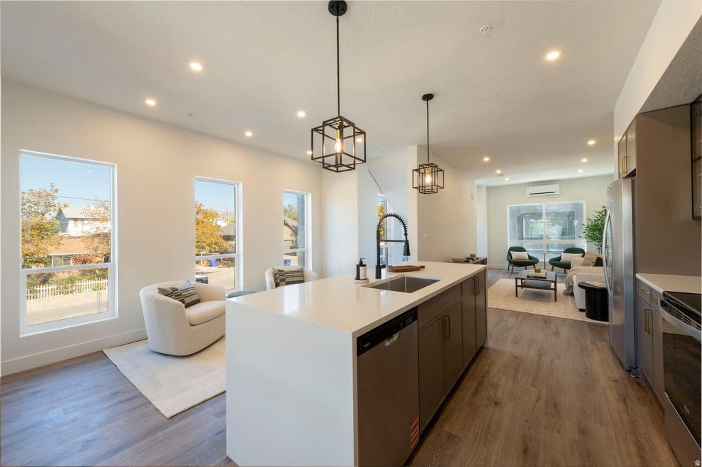 Photo of 880 E ROWLEY DR #102, Millcreek, UT 84107 (MLS # 2174156)