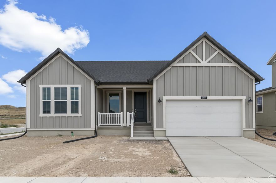 Amazing 1550 Farmhouse home in a great master planned Eagle Mountain community! This home blends classic charm with modern convenience with a stylish kitchen highlighting gray laminate cabinets, sleek quartz countertops, and stainless steel gas appliances built for both form and function. The open living space features durable laminate hardwood, vinyl tile, and carpet flooring, while can lighting and Christmas light outlets add functionality and flair. A cozy gas log fireplace anchors the living area, while additional highlights include a box window in the owner's bedroom, tankless water heater, energy-efficient options, and elegant Craftsman base and casing. The owner's bathroom offers a relaxing retreat with cultured marble shower surrounds and satin & brushed nickel hardware. Come check it out today!
