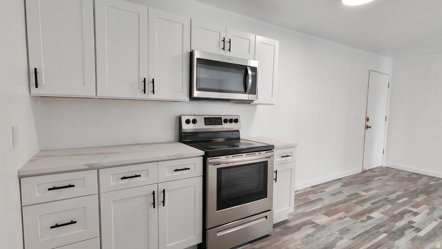 Conveniently located next to I-80, I-215 and minutes from downtown, this end-unit condo is just remodeled with a brand new high quality soft-closed kitchen cabinets. All new floorings, light fixtures and paint; new shower, toilet and vanity... The condo complex is gated, well maintained with a pool, laundry room, covered parking and secured entrance. $240 HOA fee also covers Gas, Water, Insurance , trash, sewer, snow removal. New water heater installed in 2025.