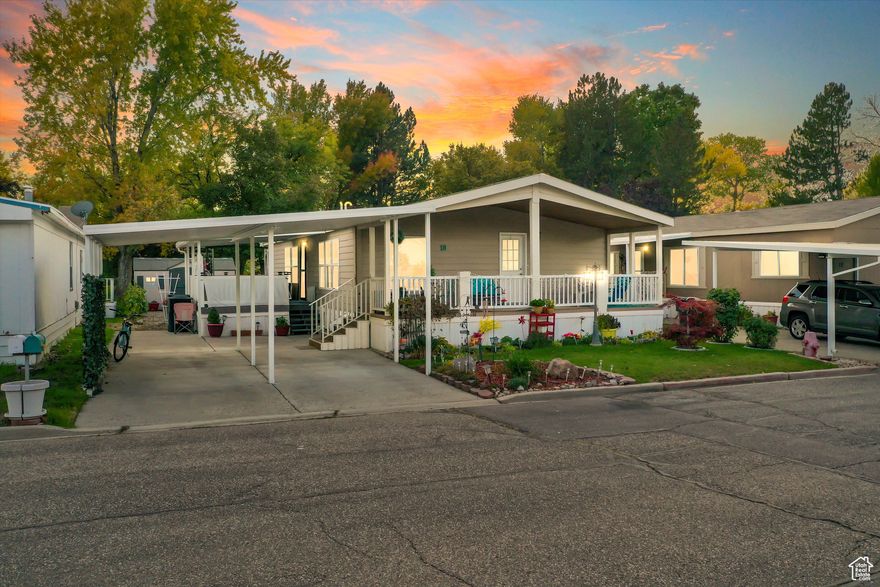 Escape to your own riverside retreat! This charming mobile home sits right on the river, offering the soothing sounds of flowing water and peaceful mountain views. Surrounded by a beautiful, mature yard with shade trees and lush greenery, the setting feels private and serene - perfect for relaxing mornings or evenings spent outdoors.  The home features a cozy, open layout with plenty of natural light and picture windows that bring the outdoors in. Step outside to enjoy spacious decks overlooking the river - ideal for entertaining, fishing, or simply soaking in the scenery. With breathtaking mountain views in the distance and a landscaped yard that blooms through the seasons, this property captures the best of Utah's natural beauty.  Whether you're looking for a weekend getaway or a full-time residence, this riverside haven offers a rare combination of comfort, nature, and tranquility.