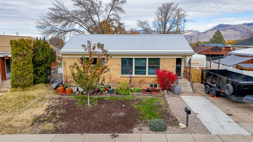 Metal roof. Newer furnace & A/C. Private yard. Flexible living. Close to HAFB + Weber State. Low maintenance + solid value in Washington Terrace. Come see the one that checks the boxes.
