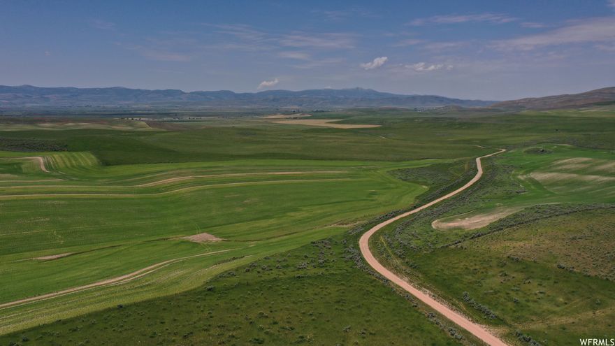 Enjoy views of the mountains, valley and Bear Lake in the distance and wildlife viewing from your porch.  Since it is surrounded by private agricultural land, the hunting pressure on wildlife is limited.   East of highway 30 with seasonal access off Banks Valley Road, this property is zoned agricultural and could be split into forty-acre parcels or larger to create homesteads with tillable dry farmland to cultivate and / or graze.  The property consists of two adjacent parcels with approximately 55+- acres lying north of Banks Valley Road and the remainder south of the road.  Since power is not available close by, each build would require solar power or portable generator and a well would need to be drilled for culinary water, stock water and to water a garden of up to half an acre.  Self-sufficiency and conservation are key when living off the grid in a rural town.  Experience the lure of the pioneer days, ranching, farming and living off the land.   Seller financing available  Dirt and gravel county road access  Seasonal access 2.5 miles off Hwy 30  Partly fenced  Off the grid  Power not available close by, solar power or portable generator needed for build  High suspension power lines cross property with easement access for maintenance