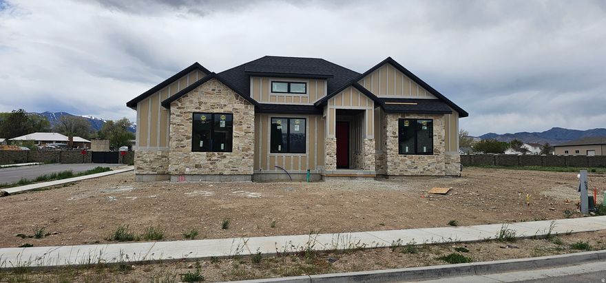 This stunning new construction rambler offers the perfect blend of thoughtful design, modern finishes, and effortless main level living with an open-concept layout, spacious kitchen and dinning room-ideal for both everyday living and entertaining. Vaulted Ceilings, 4 Car Garage, and easy to show come see for yourself we think you'll love this custom floorplan